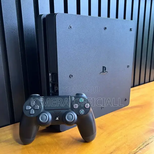 PlayStation 4 Slim with 12 Games & 2 Controllers - 1