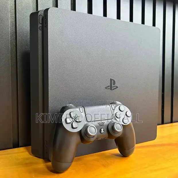 PS4 Slim Console with 12 Games and 2 Controllers - 1