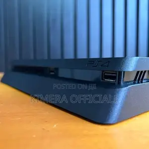 PS4 Slim Console with 12 Games and 2 Controllers