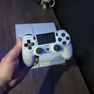 PlayStation 4 Standard - Chipped with 12 Games & 2 Controllers