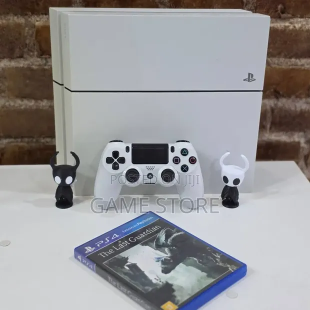 White PS4 Standard with 12 Games and 2 Controllers (Chipped, UK Used) - 1