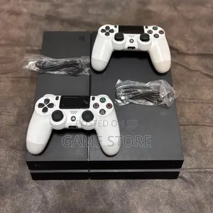 UK Used PS4 with 12 Games, 2 Controllers