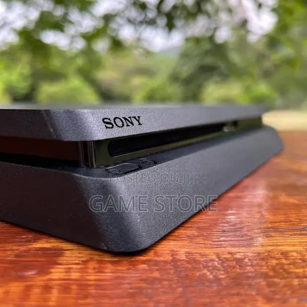 PS4 Slim Console with 12 Games & 2 Controllers - 1