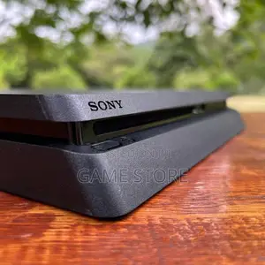 PS4 Slim Console with 12 Games & 2 Controllers