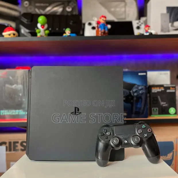 PS4 Slim Console with 12 Games & 2 Controllers - 1
