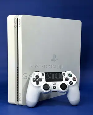 PS4 Slim Console with 12 Games and 2 Controllers