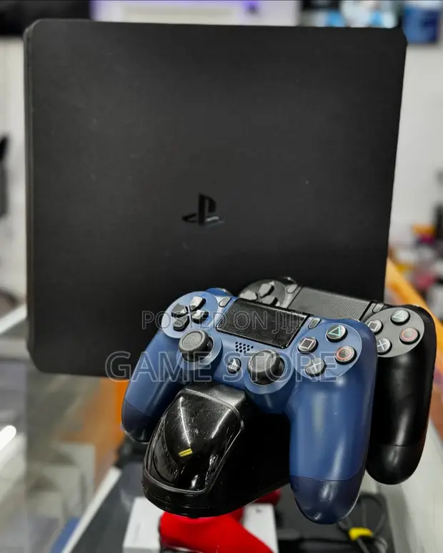 PS4 Slim Console with 12 Games & 2 Controllers - 1