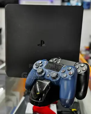PS4 Slim Console with 12 Games & 2 Controllers