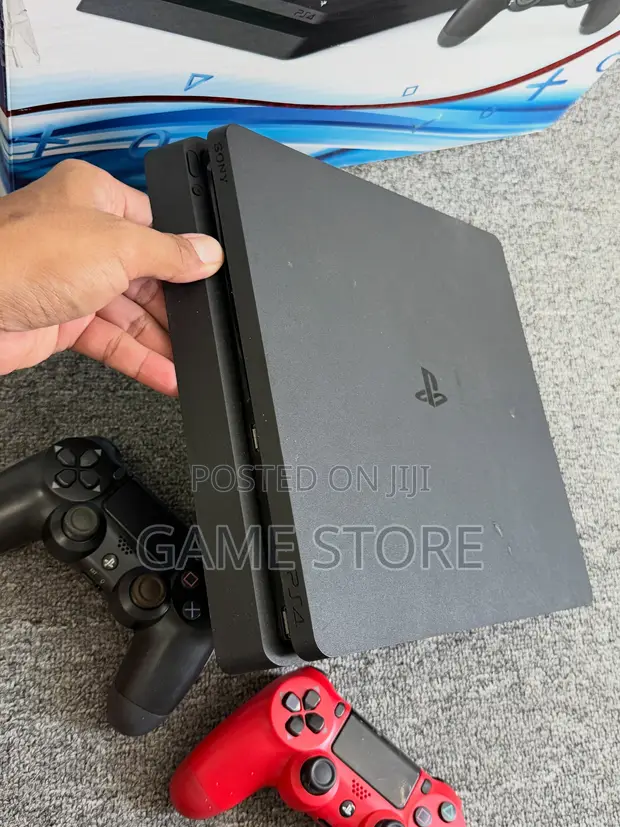 PS4 Slim Console with 12 Games & 2 Controllers - 1