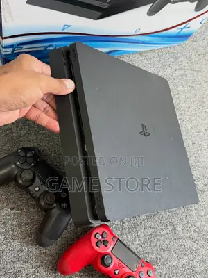 PS4 Slim Console with 12 Games & 2 Controllers