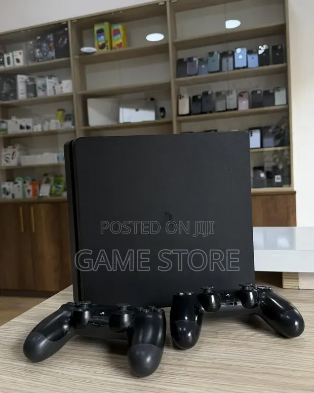 PS4 Slim Console with 12 Games & 2 Controllers - 1