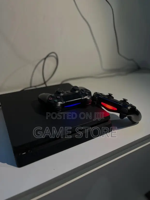 PS4 Slim Console with 12 Games & 2 Controllers - 1