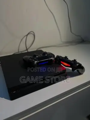 PS4 Slim Console with 12 Games & 2 Controllers