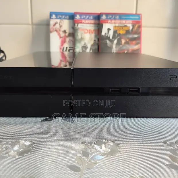 PS4 Standard Console with 12 Games & 2 Controllers - 1
