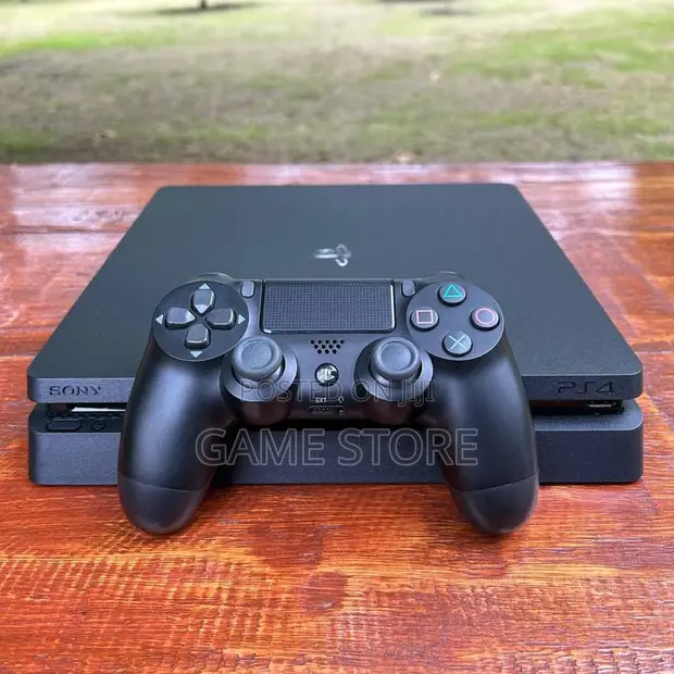 PS4 Slim Console with 12 Games and 2 Controllers - 1
