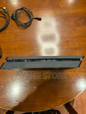 PS4 Slim Console with 12 Games & 2 Controllers