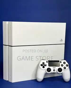 PS4 Fat Console with 12 Games & 2 Controllers