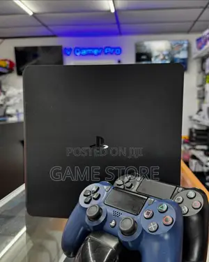 PS4 Slim Console with 12 Games & 2 Controllers