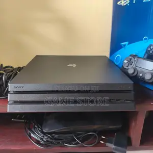 PS4 Pro Console with 12 Games and 2 Controllers