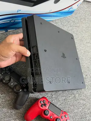 PS4 Slim Console with 12 Games & 2 Controllers