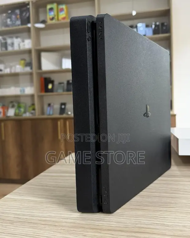 PS4 Slim Console with 12 Games & 2 Controllers - 1