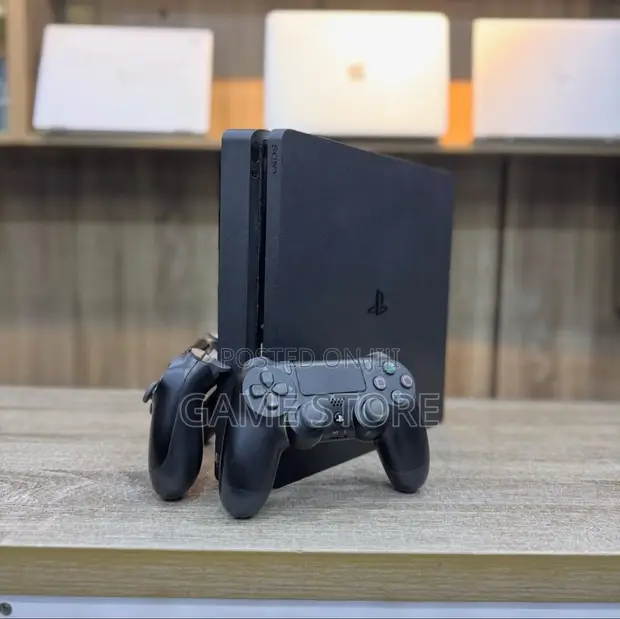 PS4 Slim Console with 12 Games & 2 Controllers - 1