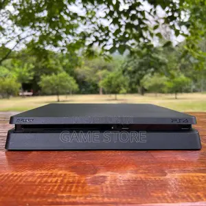 PS4 Slim Console with 12 Games & 2 Controllers