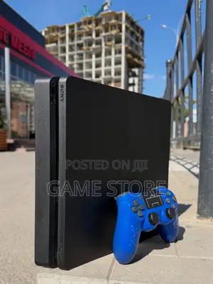 PS4 Slim Console with 12 Games & 2 Controllers