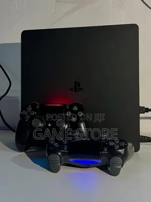 PS4 Slim Console with 12 Games and 2 Controllers