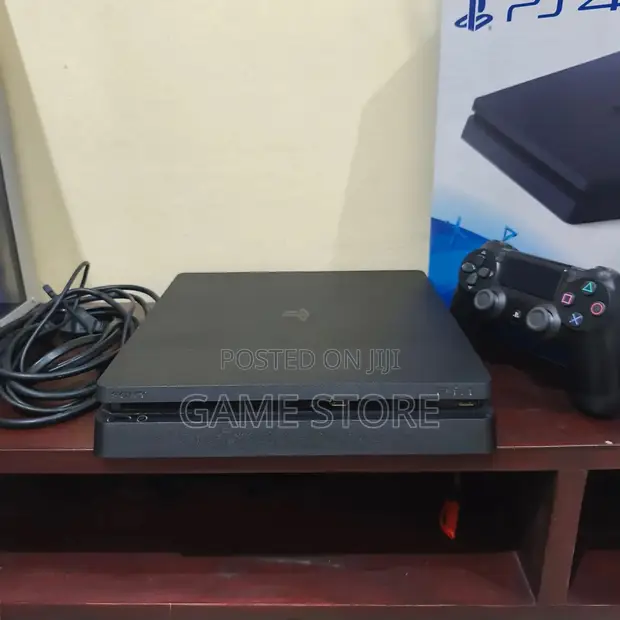 PS4 Slim Console with 12 Games & 2 Controllers - 1
