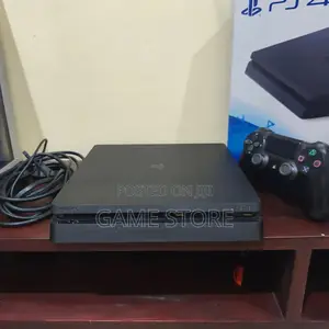 PS4 Slim Console with 12 Games & 2 Controllers