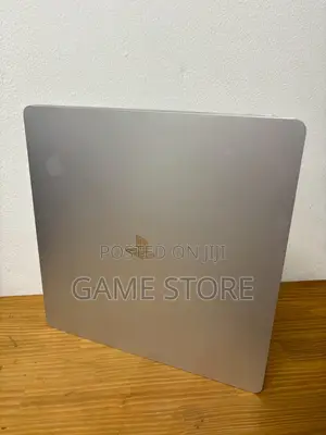 PS4 Slim Console with 12 Games & 2 Controllers
