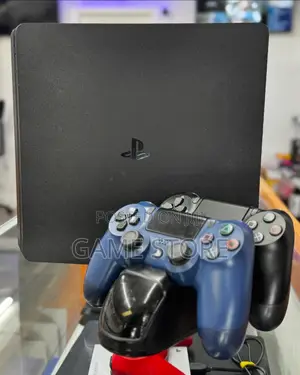 PS4 Slim Console with 12 Games & 2 Controllers
