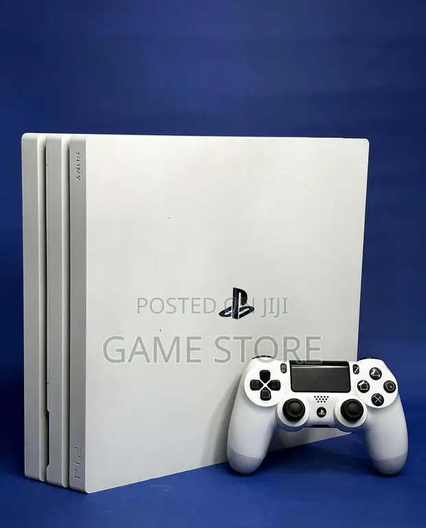 PS4 Pro Console with 12 Games and 2 Controllers - 1