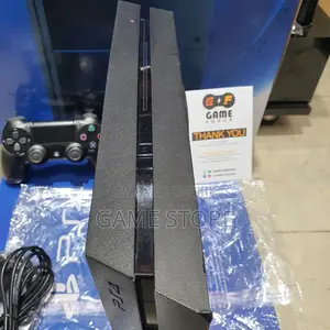 PS4 Standard Console with 12 Games & 2 Controllers