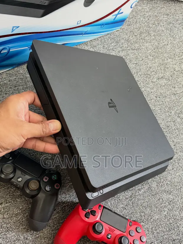 PS4 Slim Console with 12 Games and 2 Controllers - 1