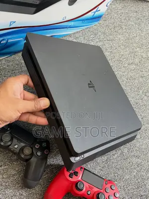 PS4 Slim Console with 12 Games and 2 Controllers