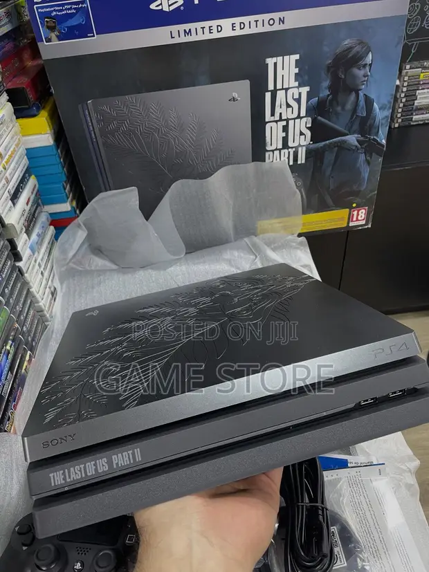 PS4 Pro Console with 12 Games and 2 Controllers - 1
