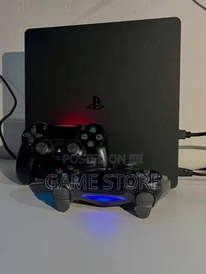 PS4 Slim Console with 12 Games and 2 Controllers