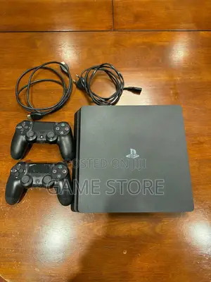 PS4 Slim Console with 12 Games & 2 Controllers