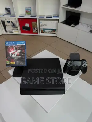 PS4 Slim Console with 12 Games and 2 Controllers
