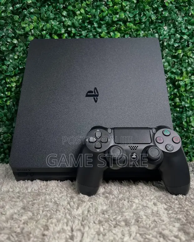 PS4 Slim Console with 12 Games and 2 Controllers - 1