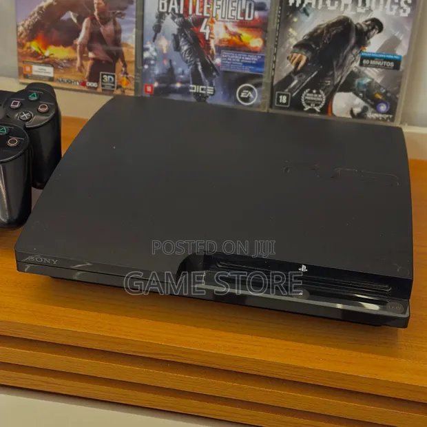 PlayStation 3 Slim Console with 15 Games & 2 Controllers - 1