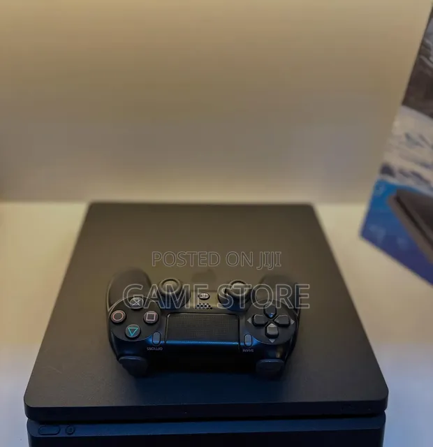 PS4 Slim Console with 12 Games and 2 Controllers - 1