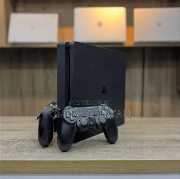 PS4 Slim with 12 Games & 2 Controllers - 1
