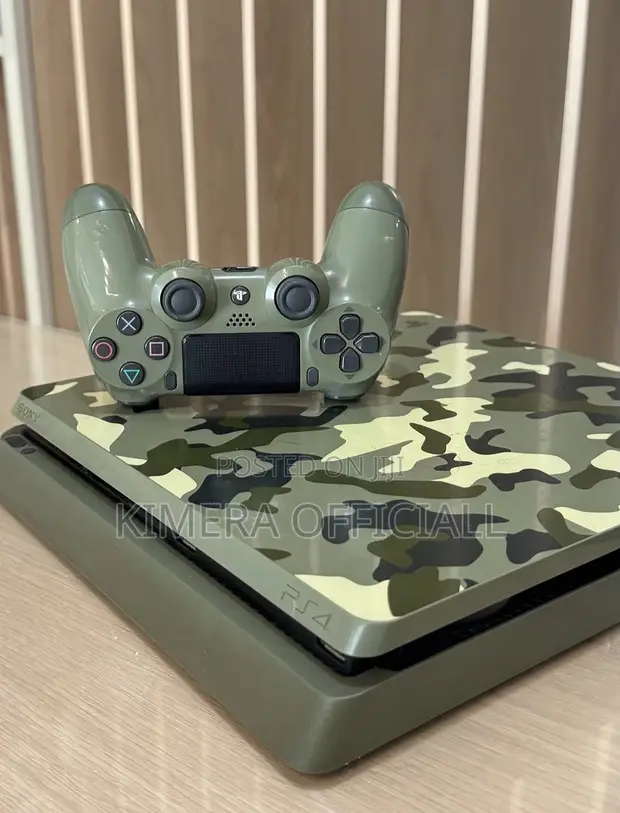 PS4 Slim Console with 12 Games & 2 Controllers - 1
