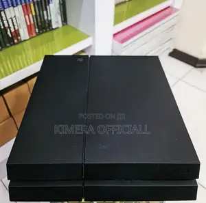 PS4 Standard Console with 12 Games & 2 Controllers