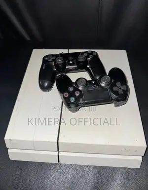 PS4 Standard Console with 12 Games & 2 Controllers