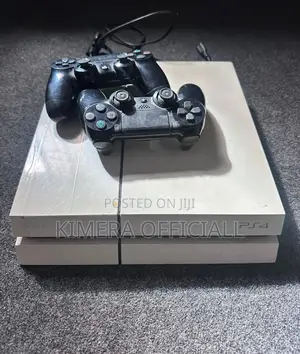 PS4 Standard Console with 12 Games and 2 Controllers