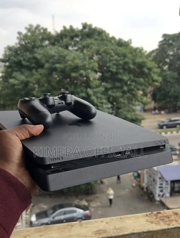PS4 Slim Console with 12 Games & 2 Controllers - 1